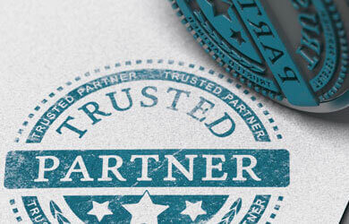 A blue stamp that reads "Trusted Partner."